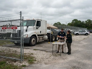 Pair Charged After 4 Children Found in Semi Cab