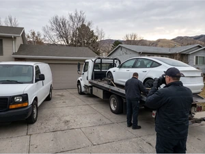 Man Charged After Girlfriend Found Dead in Tesla